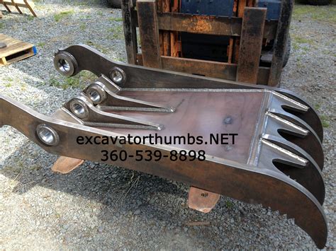 mini excavator bucket thumb|used mechanical thumbs for excavators.